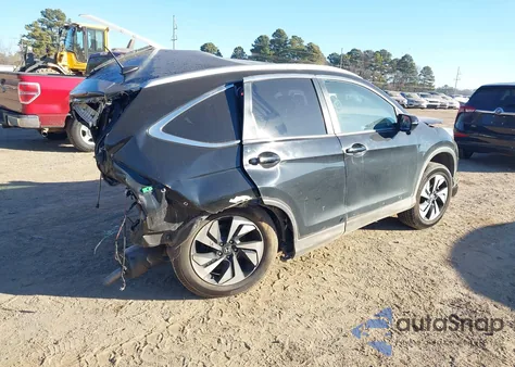 2016 Honda Cr-V Touring z USA, uszkodzony, nr VIN 5J6RM4H98GL046510